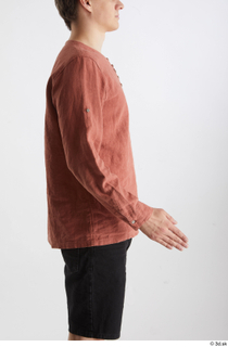 Brett  1 casual dressed orange linen shirt side view…